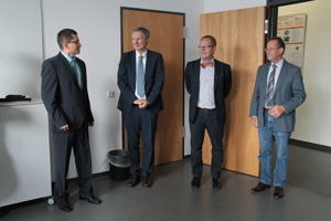 Picture of Alexandru-Petru Tanase (l), Prof. Teich (second from left), Prof. Snelting (second from right) and Prof. Rabenstein (r)