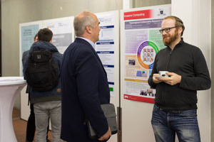 from the left: Dr. Hannig in technical discussion about InvasIC with Dr. Ziene.r