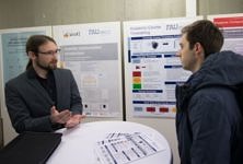 Bernd Bassimir (left) presenting the ACT project to a student.