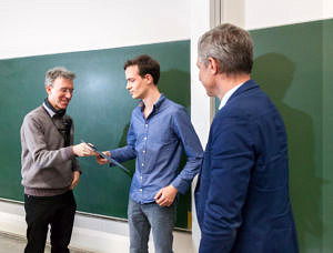 Picture of Prof. Freiling (left), Jan Spieck (middle) and Prof. Teich (right)