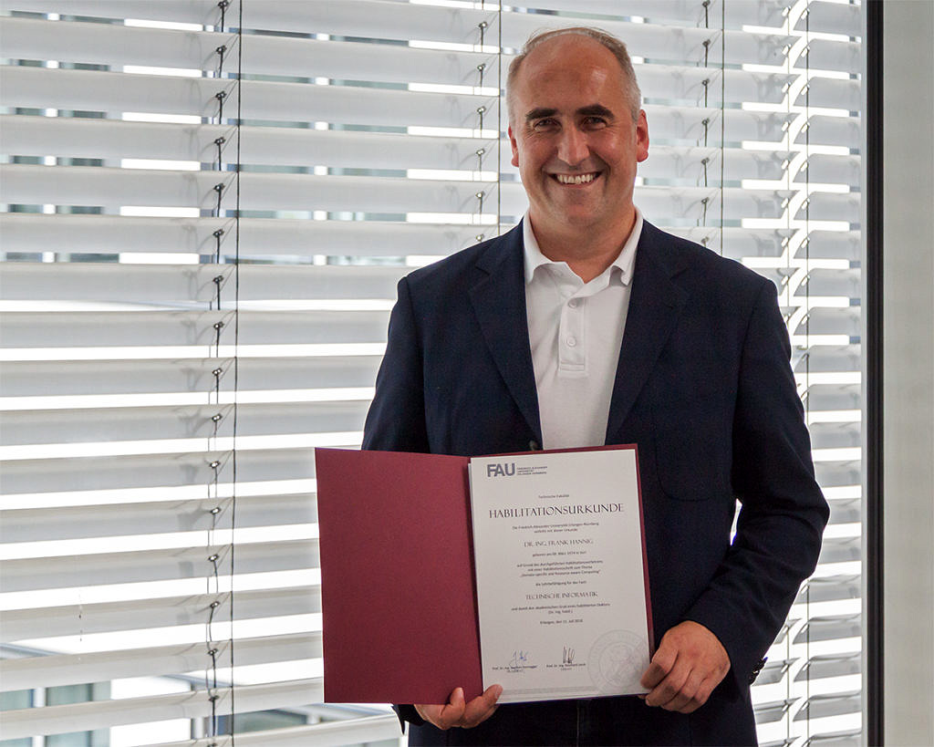 Picture of Frank Hannig with his appointment certificate