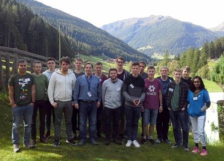 Group of beautiful people in front of mountains