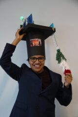 A man with a doctorals hat