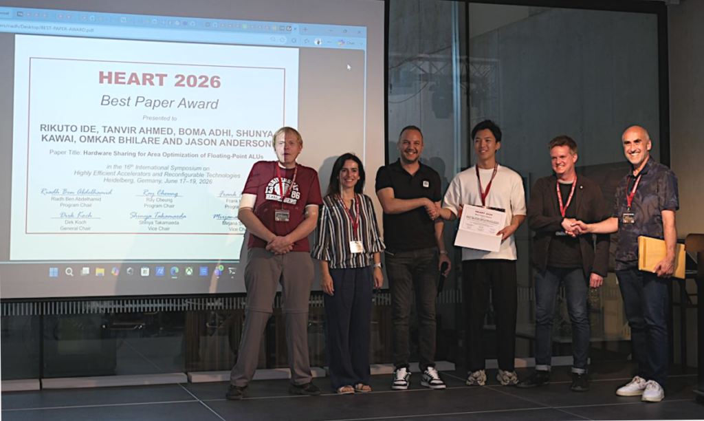 Presentation of the HEART 2026 Best Paper Award for the paper "Hardware Sharing for Area Optimization of Floating-Point ALUs" by Rikuto Ide, Tanvir Ahmed, Boma Adhi, Shunya Kawai, Omkar Bhilare, and Jason Anderson. From left to right: Dirk Koch (General Chair), Mirjana Stojilović (Vice Chair), Riadh Ben Abdelhamid (Program Co-Chair), Rikuto Ide (Best Paper Award Winner), Jason Anderson (Best Paper Award Winner), and Frank Hannig (Program Co-Chair).